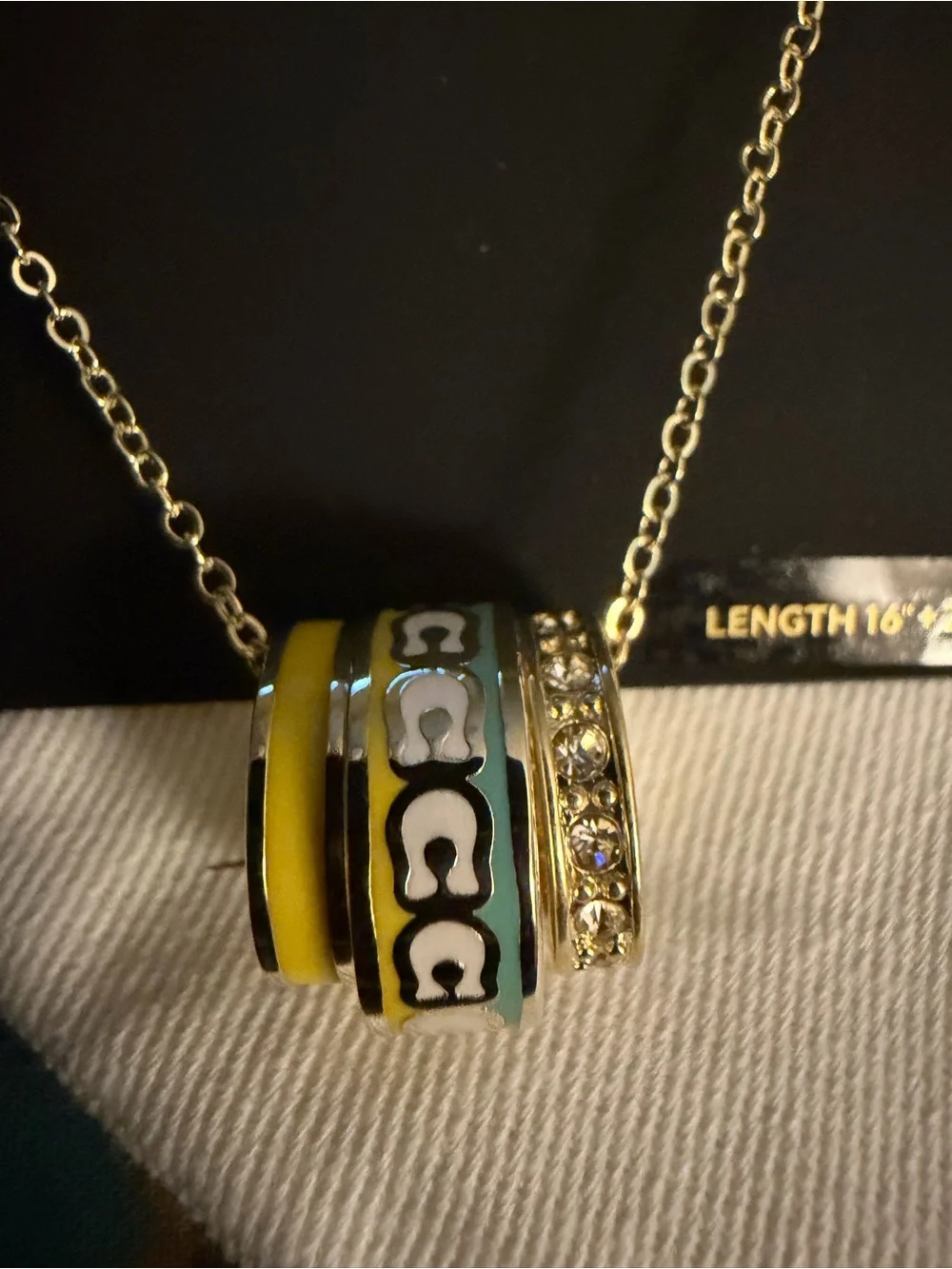 COACH Gold-Tone Yellow and Green Enamel Ring Pendant Necklace